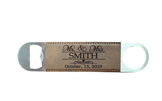 Personalized bottle opener with engraved text on a leather surface